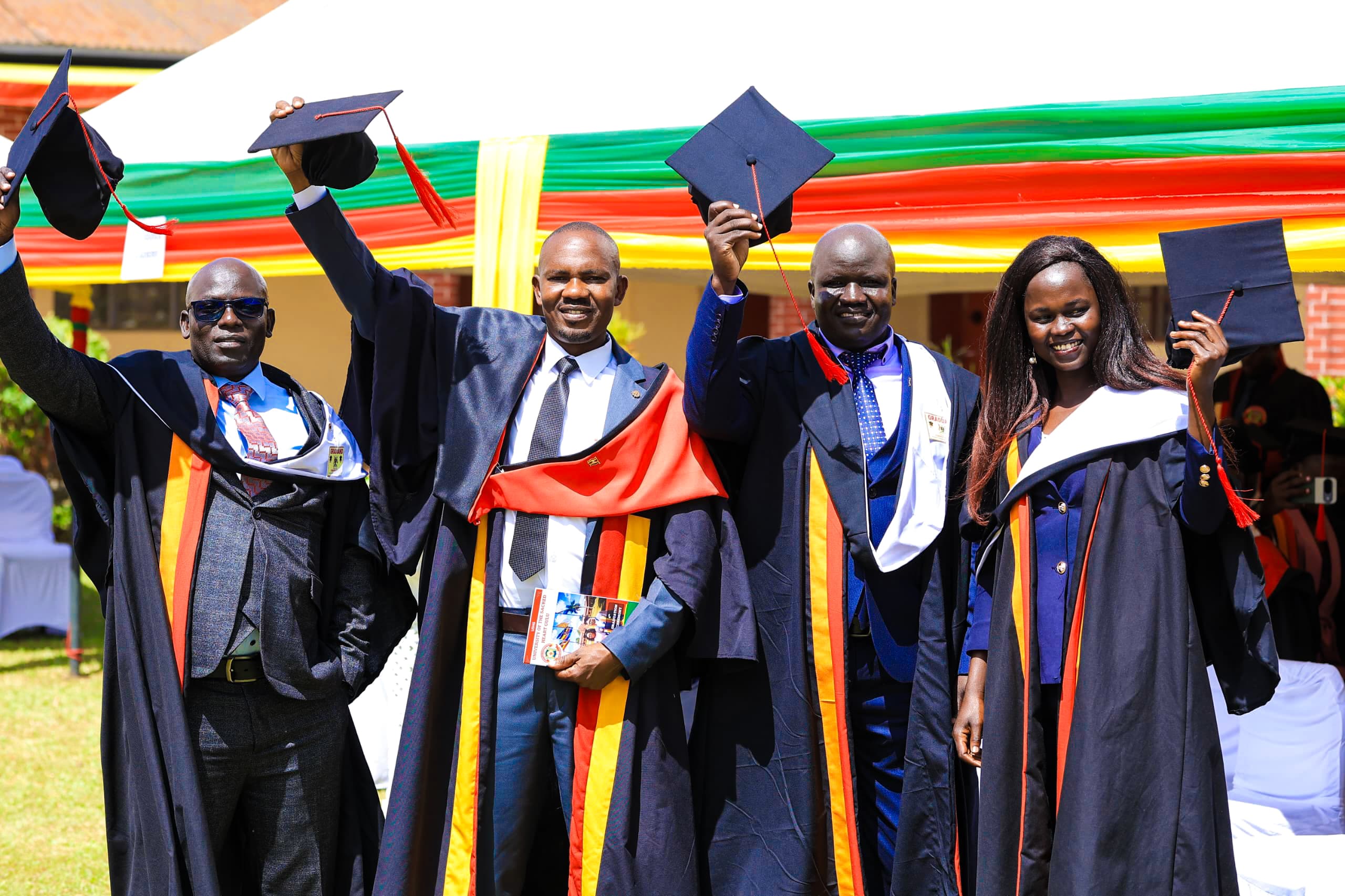 Graduates with diplomas