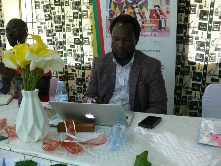 Mr. Charles Abola